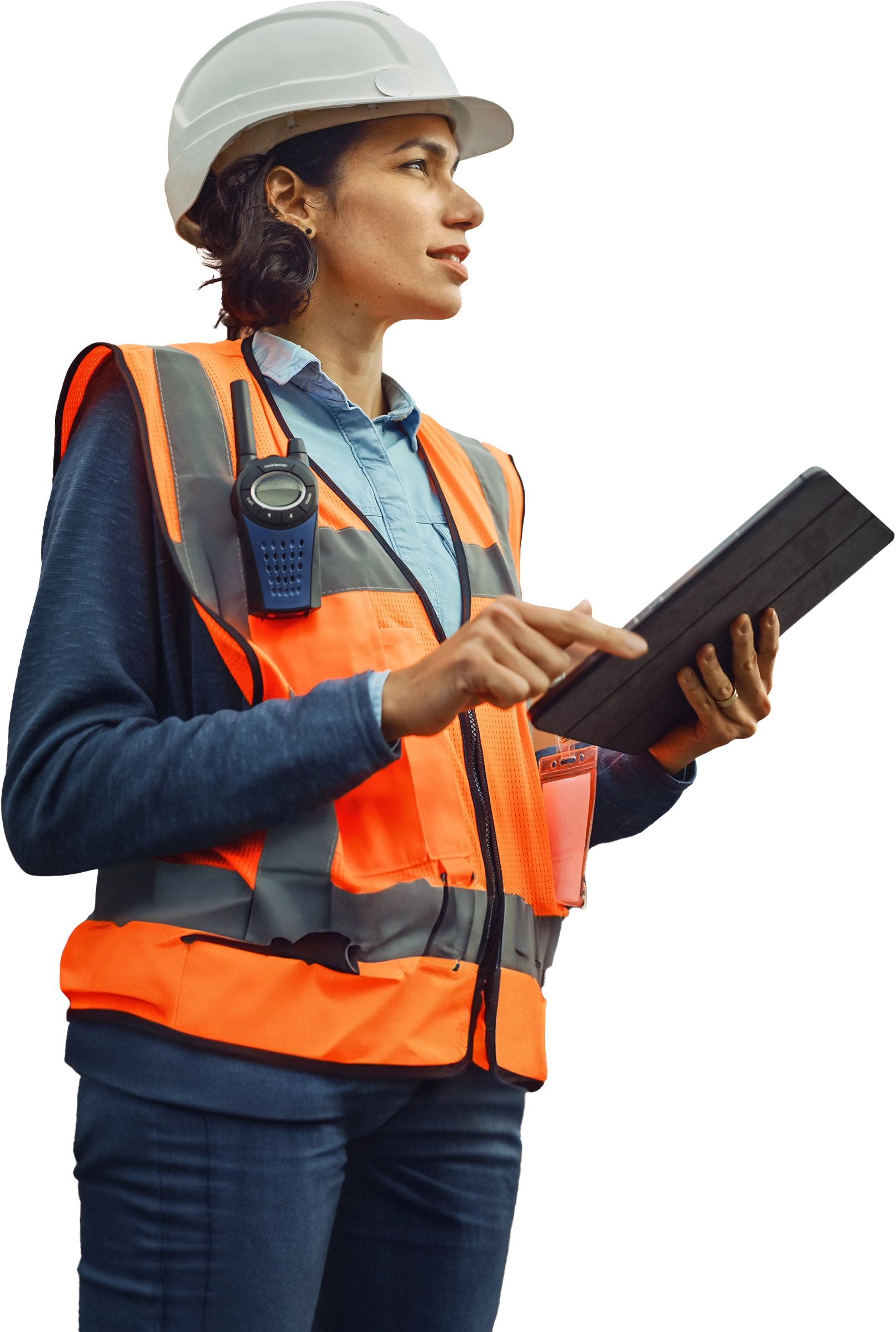 Worker in a hard hat and safety vest reviewing safety data sheets on a tablet